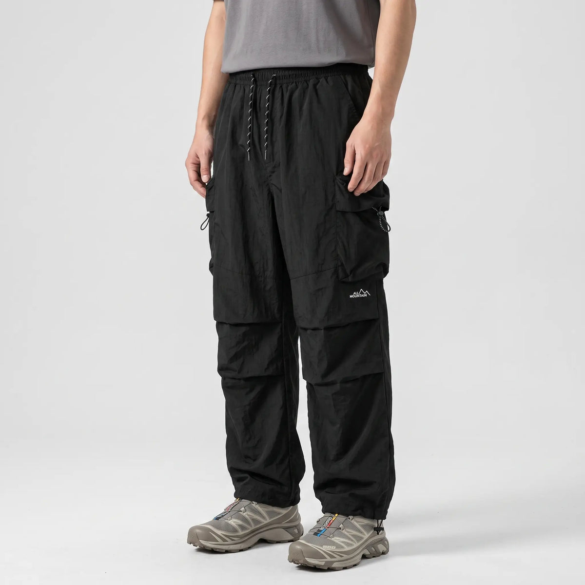 Men’s Baggy Cargo Pants with Zip Pockets and Adjustable Drawstring Waist and Ankles