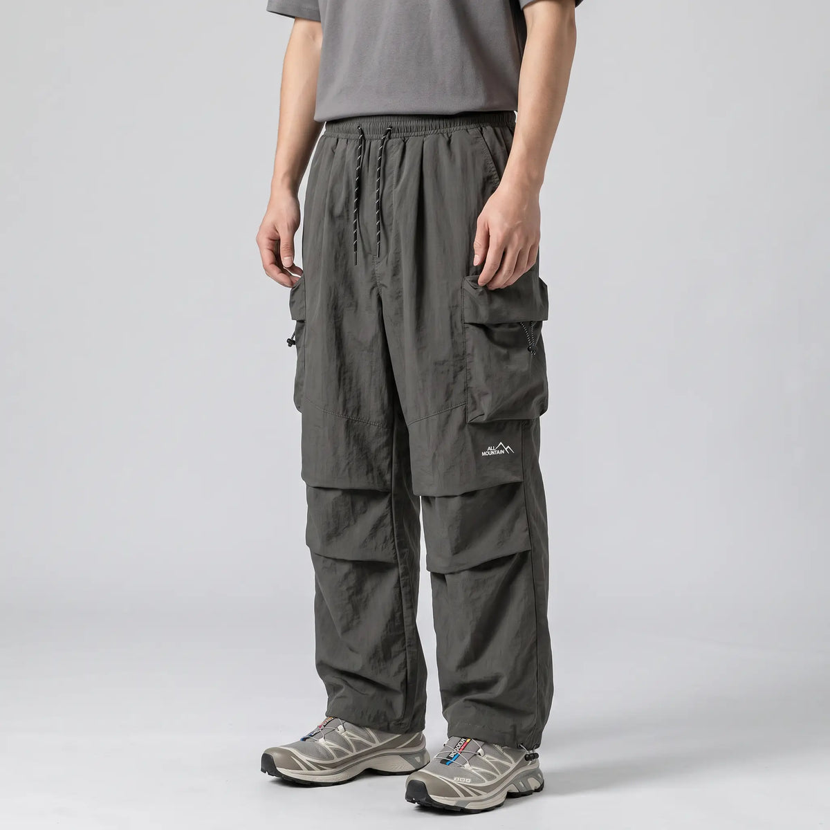 Men’s Baggy Cargo Pants with Zip Pockets and Adjustable Drawstring Waist and Ankles