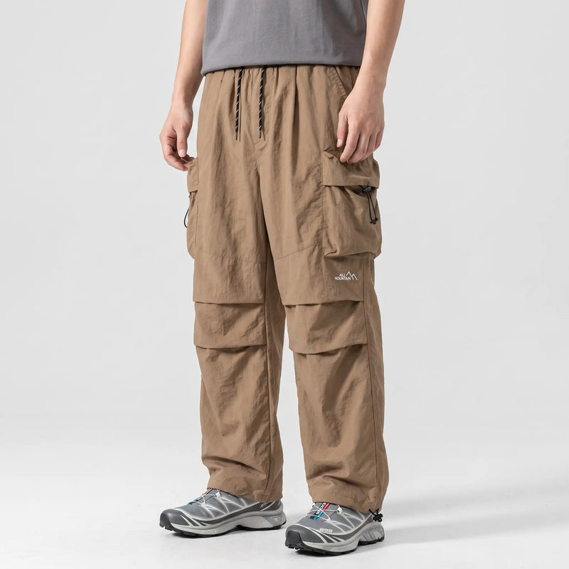 Men’s Baggy Cargo Pants with Zip Pockets and Adjustable Drawstring Waist and Ankles
